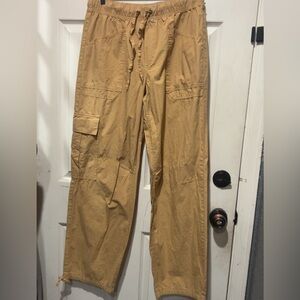 Happily Grey baggy utility shorts in a warm tan color made from 100% cotton